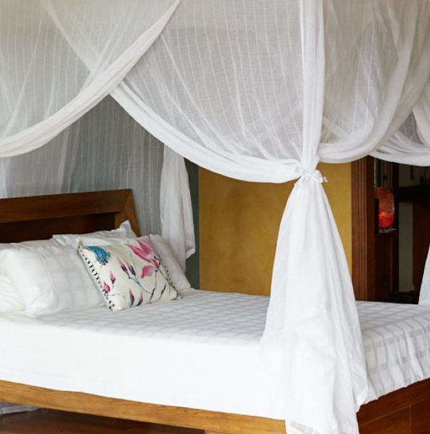 Box mosquito net over a double bed